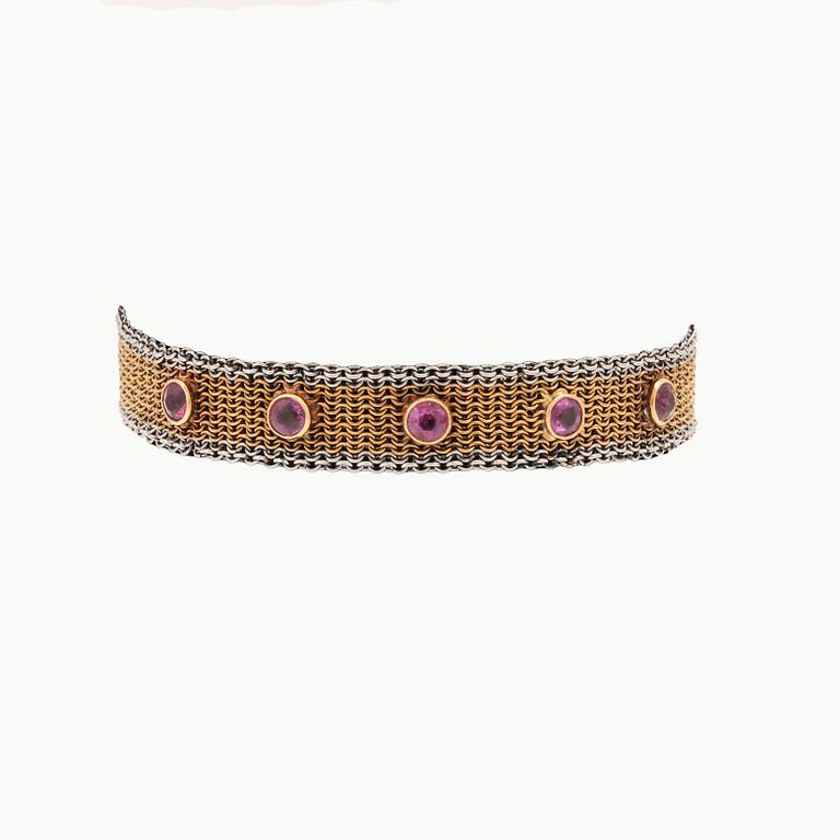 An 18K gold bracelet with old cut rubies, possibly by K Anderson Stockholm, around 1900's.