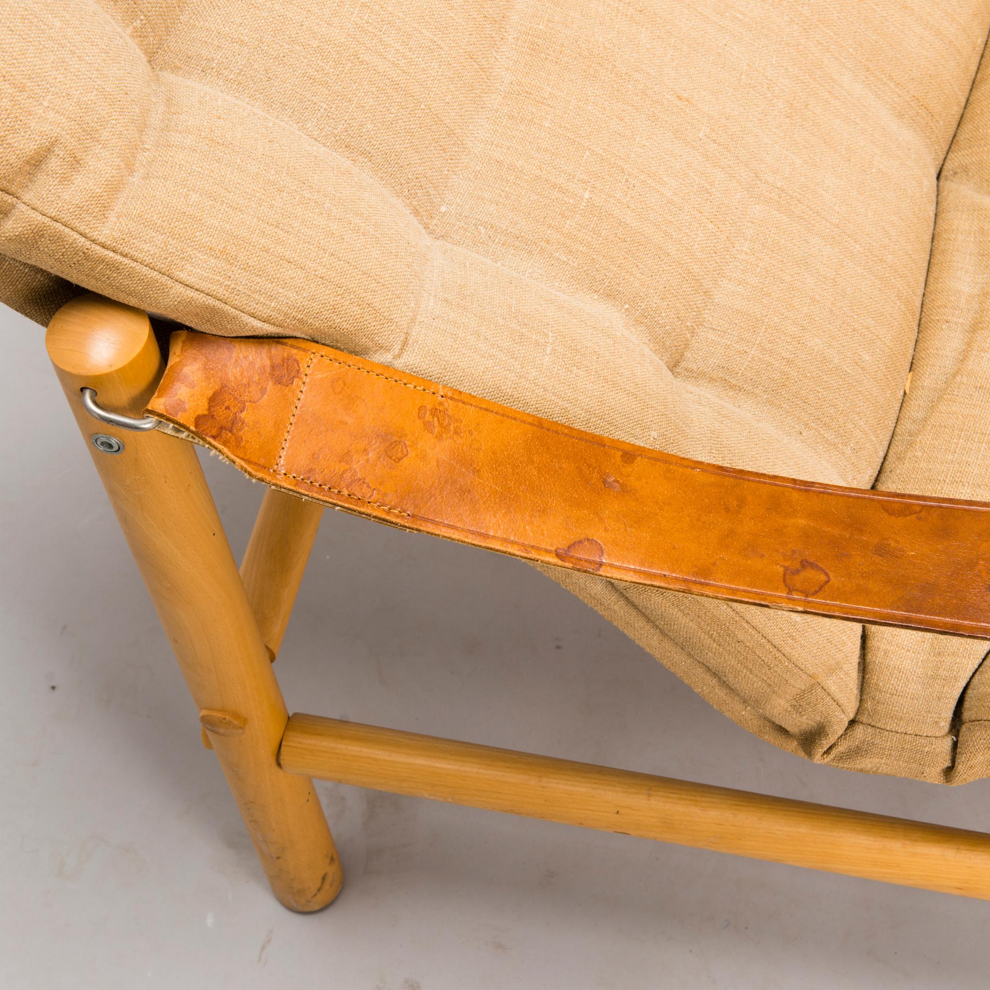 BROR BOIJE, A pair of 'Junker' easy chairs and an ottoman for Dux, Sweden, latter half of the 20th Century.