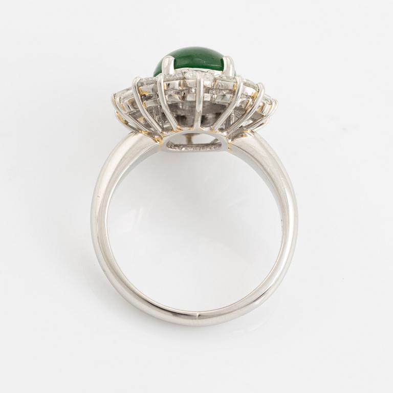 Cabochon jade and baguette and brilliant cut diamond ring.