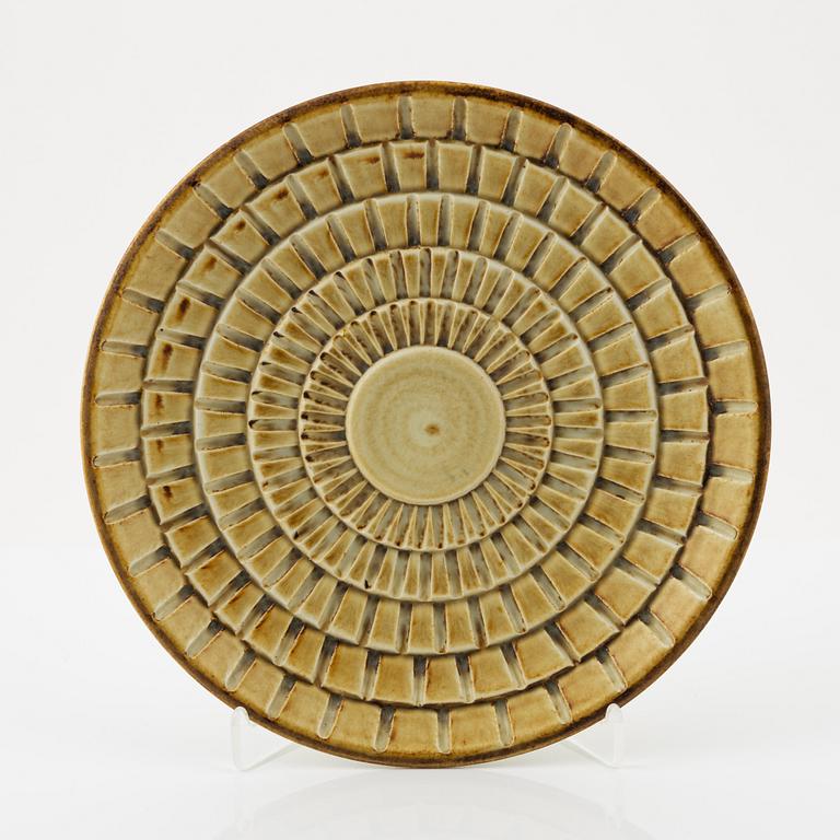 A stoneware plate by Gertrud Lönegren, Rörstrand, mid 20th Century.