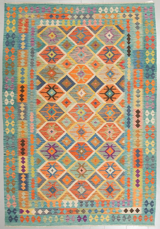 A KILIM RUG, 300 x 210 cm.