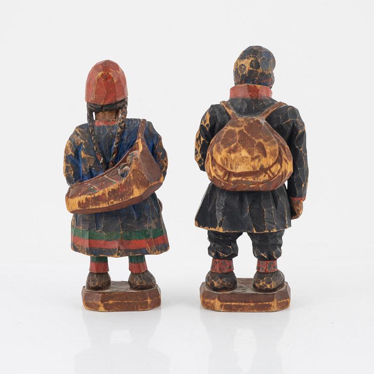 Torborg Lindberg-Karlsson, a pair of figurines, carved and painted wood, signed TL.