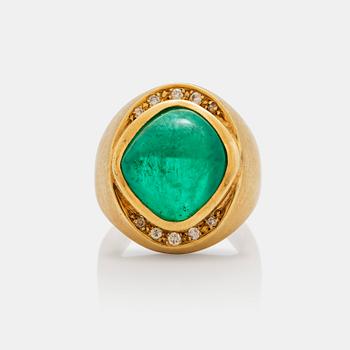 617. A circa 12.00 ct cabochon cut emerald and brilliant cut diamonds signed Cartier.