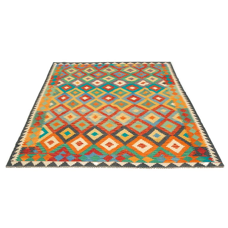 A kilim carpet, c 300 x 205 cm.