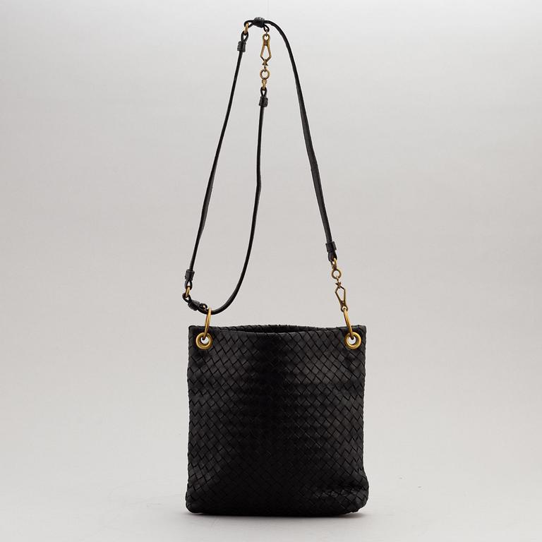 Bottega Veneta, a black intrecciato handbag.