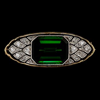 209. A tourmaline and diamond brooch, 1930's.