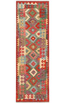 A carpet, Kilim, c. 289 x 78 cm.