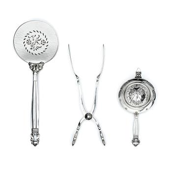 328. Georg Jensen, serveringsspade, smörgåstång och tesil, sterling silver, 3 delar, Köpenhamn efter 1945 och en del 1925-1932.