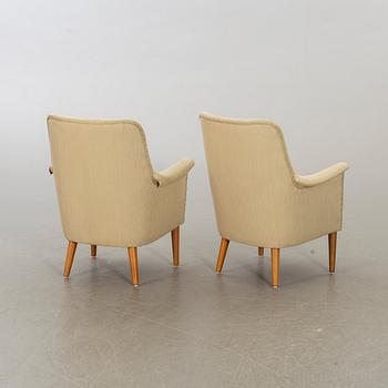 CARL MALMSTEN, a pair of easy chairs.