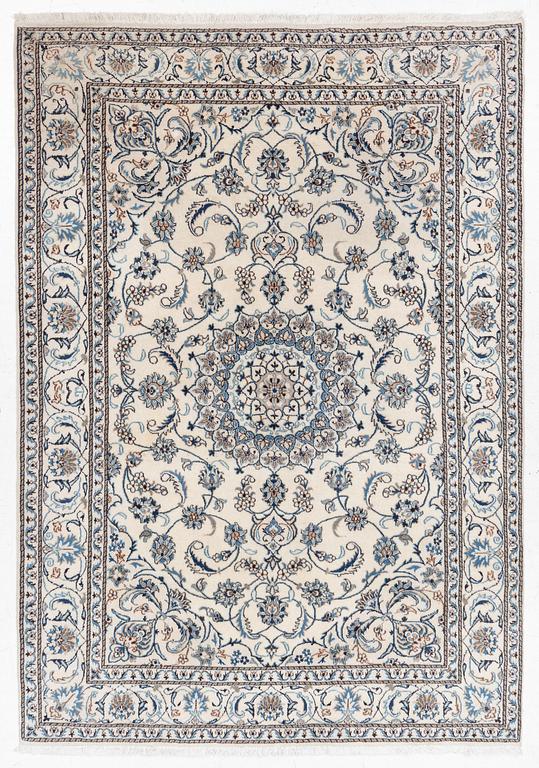 A Nain carpet, c. 275 x 195 cm.