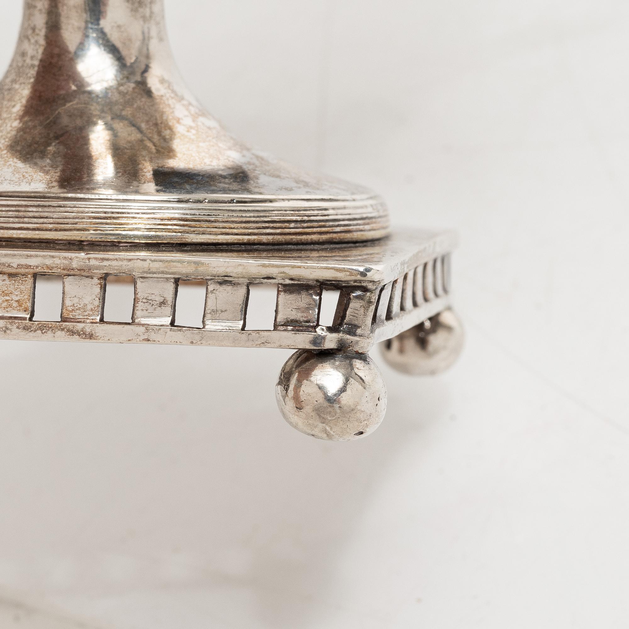 A Swedish Gustavian parcel-gilt silver sauce jug, mark of Daniel Hallman, Stockholm 1810.