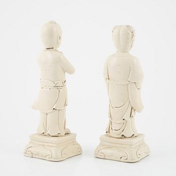 Two Chinese blanc de chine figurines, 20th Century.