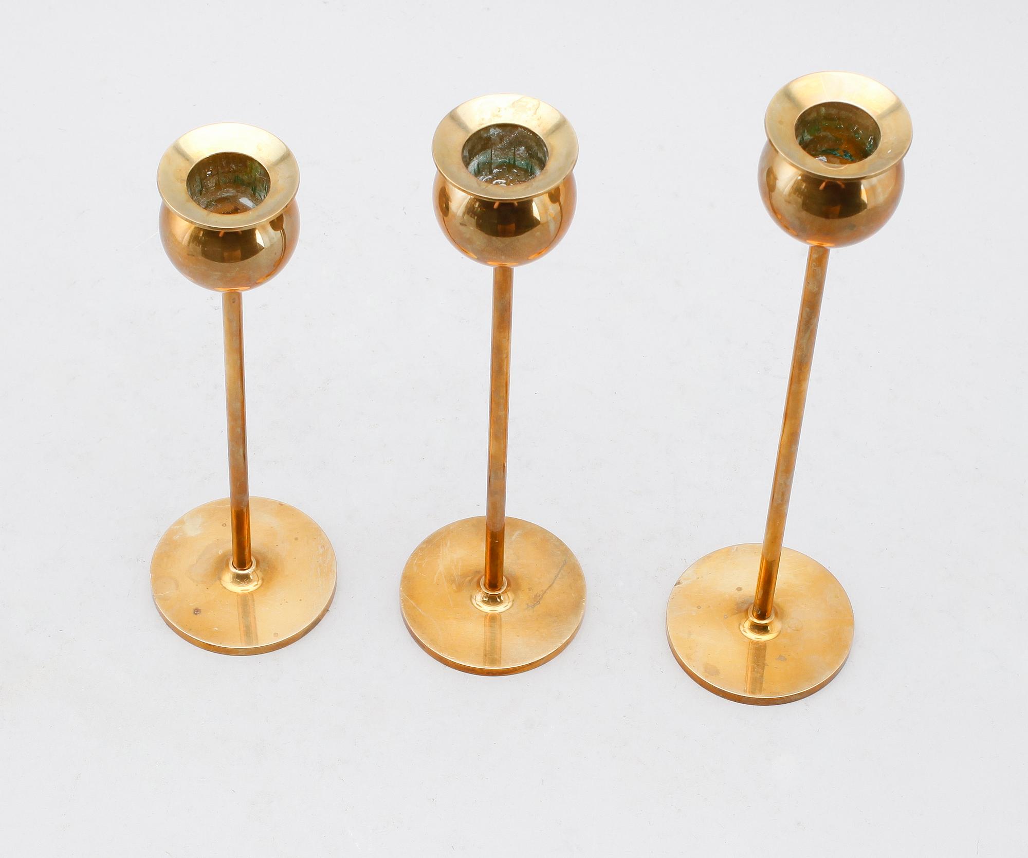 LJUSSTAKAR, 3 st, mässing, "Tulpan", Pierre Forsell, Skultuna.