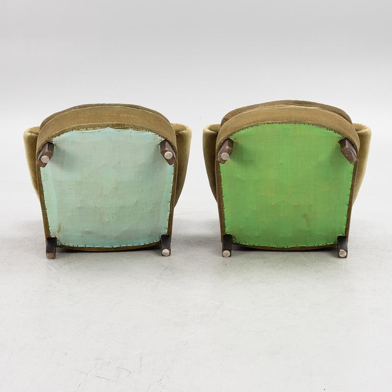 A pair of 1930's/40's armchairs.