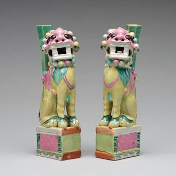 A pair of famille rose joss stick holders, Qing dynasty, circa 1800.