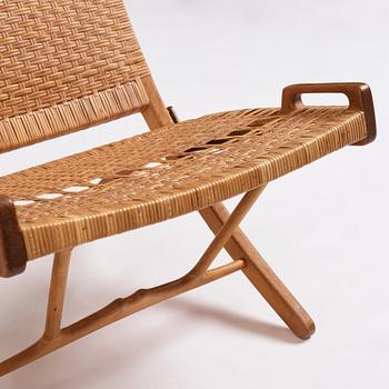 Hans J. Wegner, a pair of oak and rattan folding chairs 'JH-512', Johannes Hansen, Denmark 1950-60s.