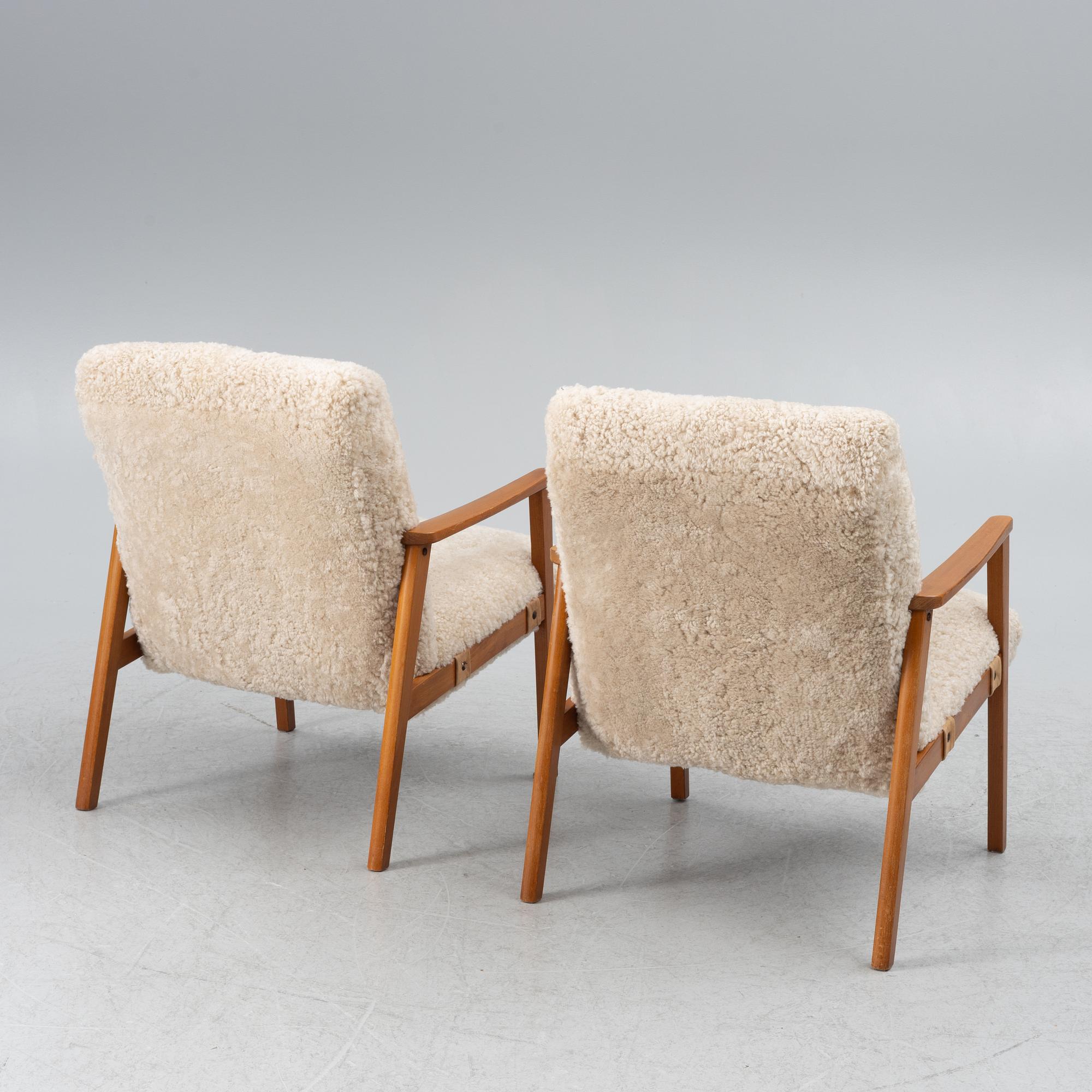 A pair of armchairs, mid-20th century.