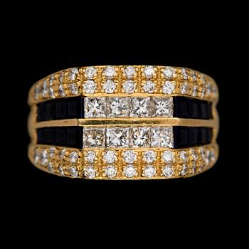 278. A blue  sapphire and diamond ring, tot. app. 1 cts.