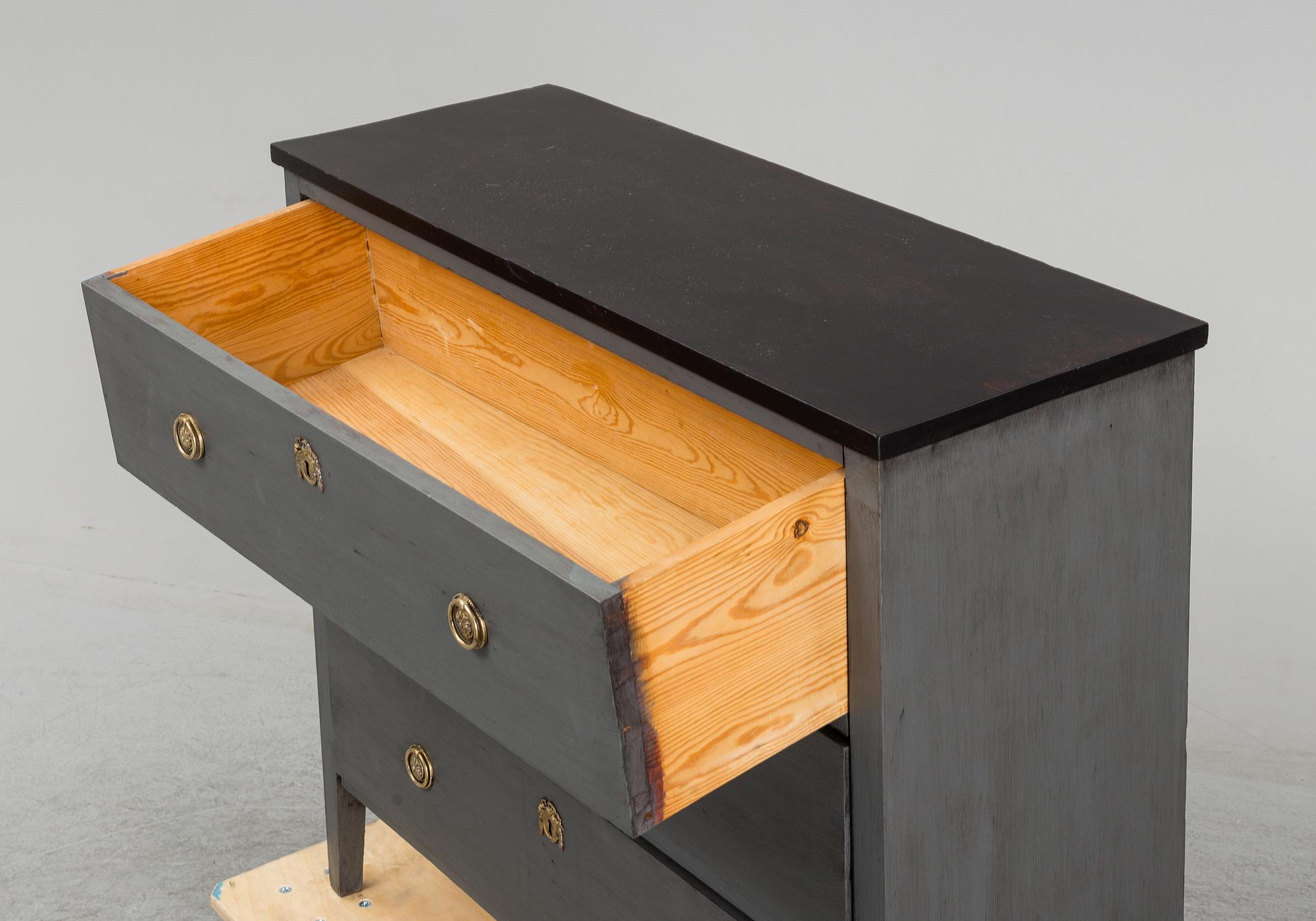 A chest of drawers from the first half of the 20th century.