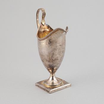 A silver creamer, indistinct makers mark, London, 1791.