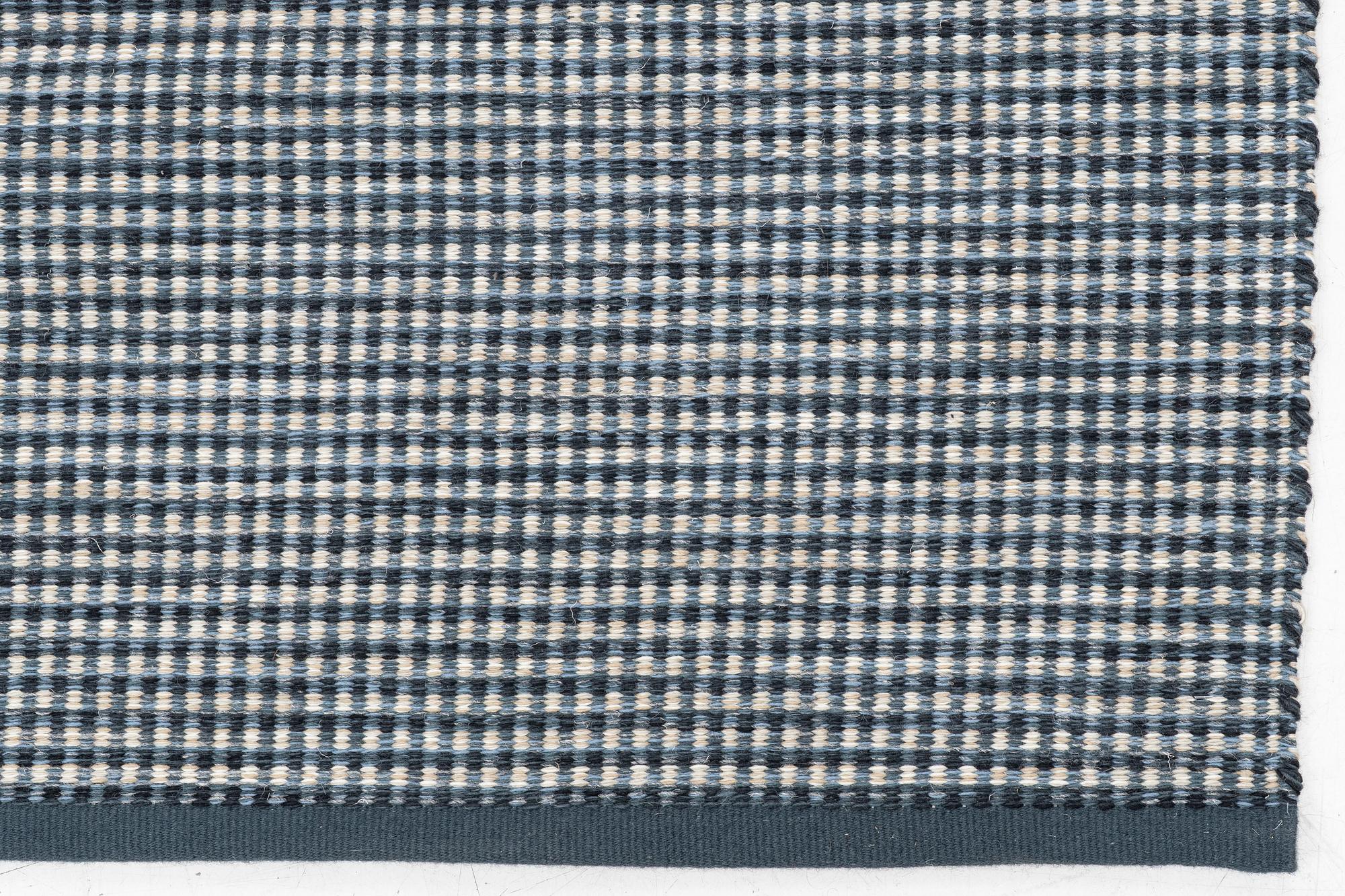 Gunilla Lagerhem Ullberg, a flat-woven 'Häggå' carpet, Kasthall, 2021, ac. 370 x 310 cm.