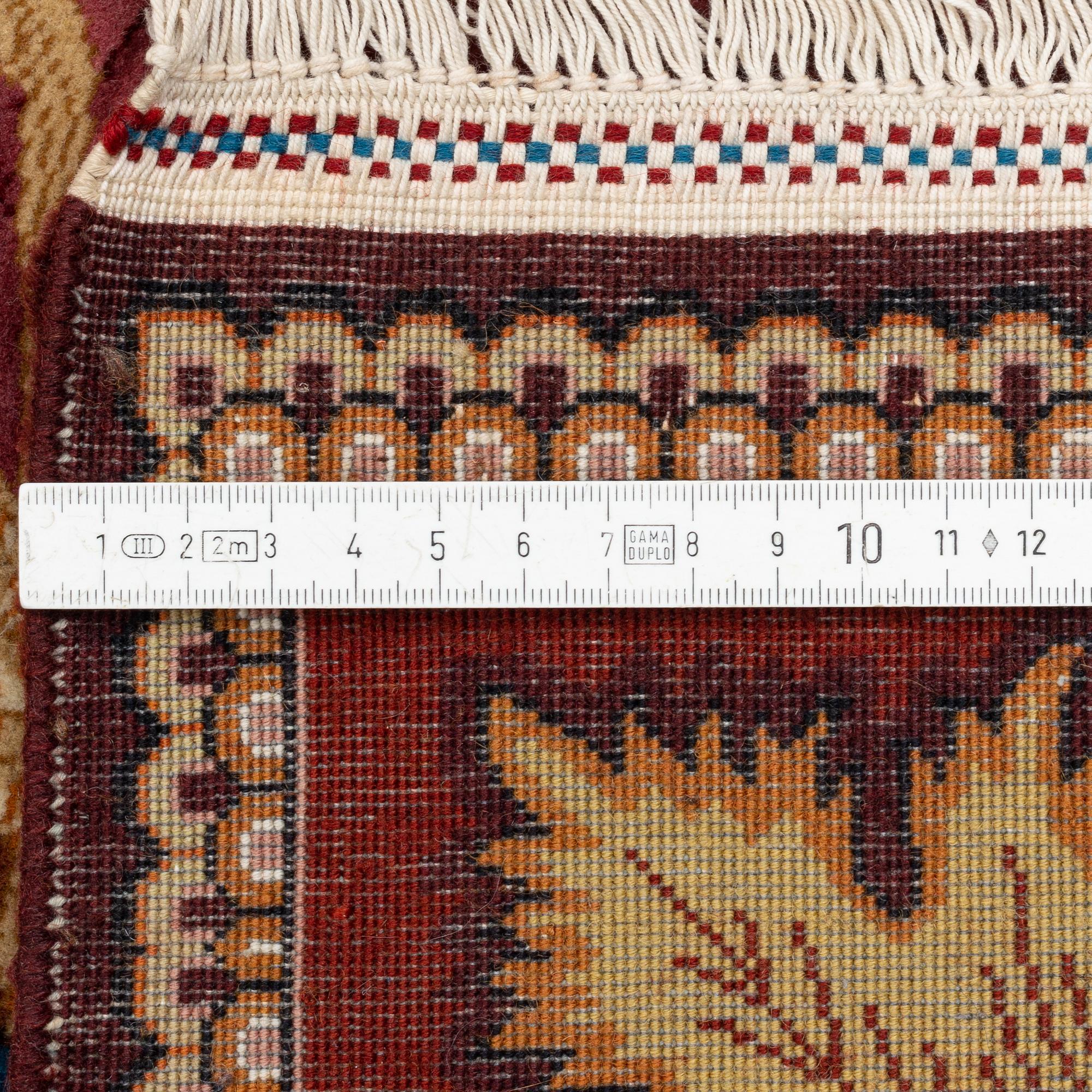 Rug, Tabriz, figural, signed, approx. 285 x 196 cm.