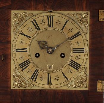 A Queen Anne early 18th century brass-mounted walnut striking table clock by Jacobeus Markwick.