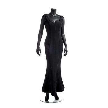 657. ESCADA, a black wool evening dress.