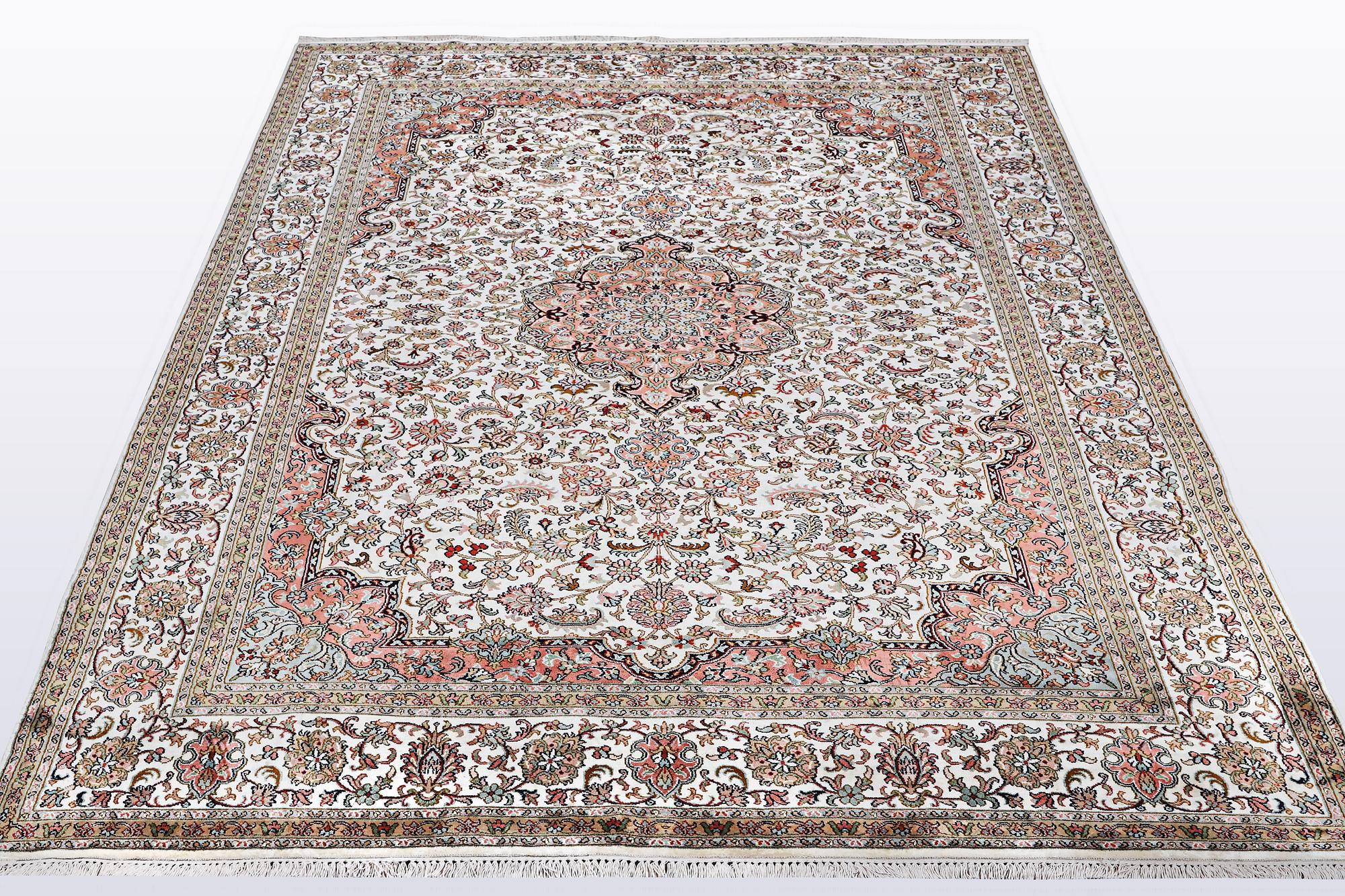 A carpet, silk Kashmir, ca 260 x 172 cm.