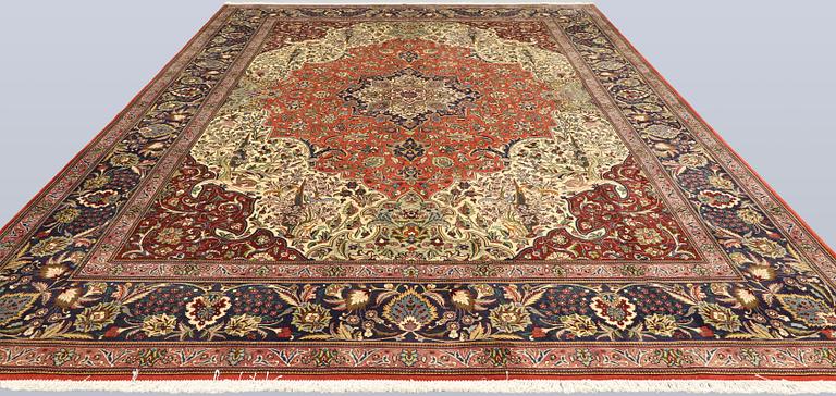 A Tabriz carpet, so called 40 Raj, c. 396 x 296 cm.