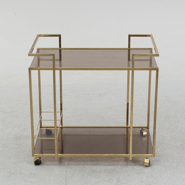 A brass and glass drink trolley, end of the 20th Century.