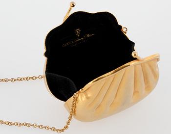 A Gucci evening bag.