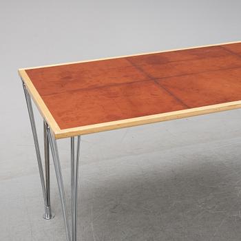 A birch and leather dining table produced by Mathsson International, 21th century.