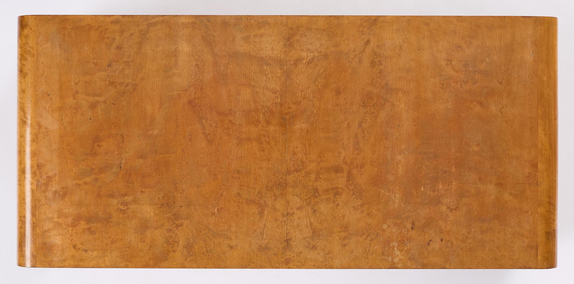 Swedish Modern, a birch veneered coffee table, 1930s-40s.