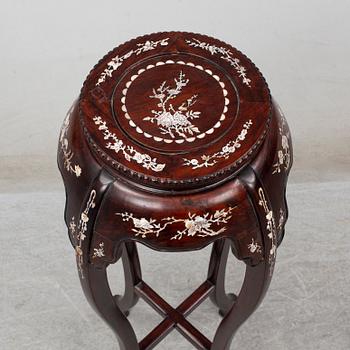 A Chinese wooden pedestal, 20th Century.