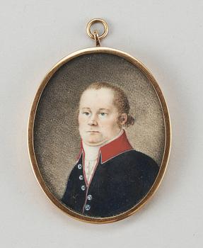 597. A miniature portrait of a gentlemen from the early 19th century.