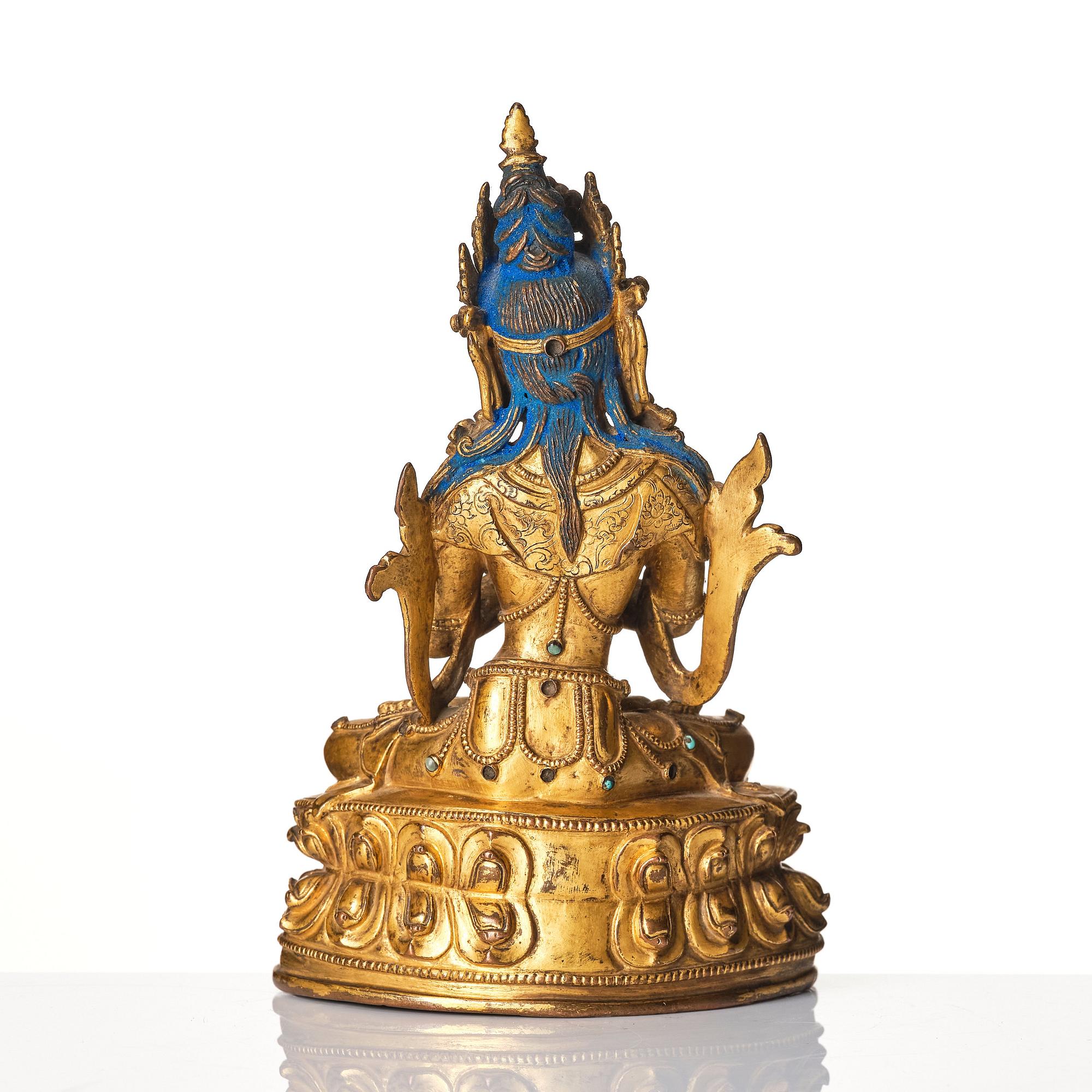 A gilt-bronze figure of Vajradhara
Tibet, circa 16th century.