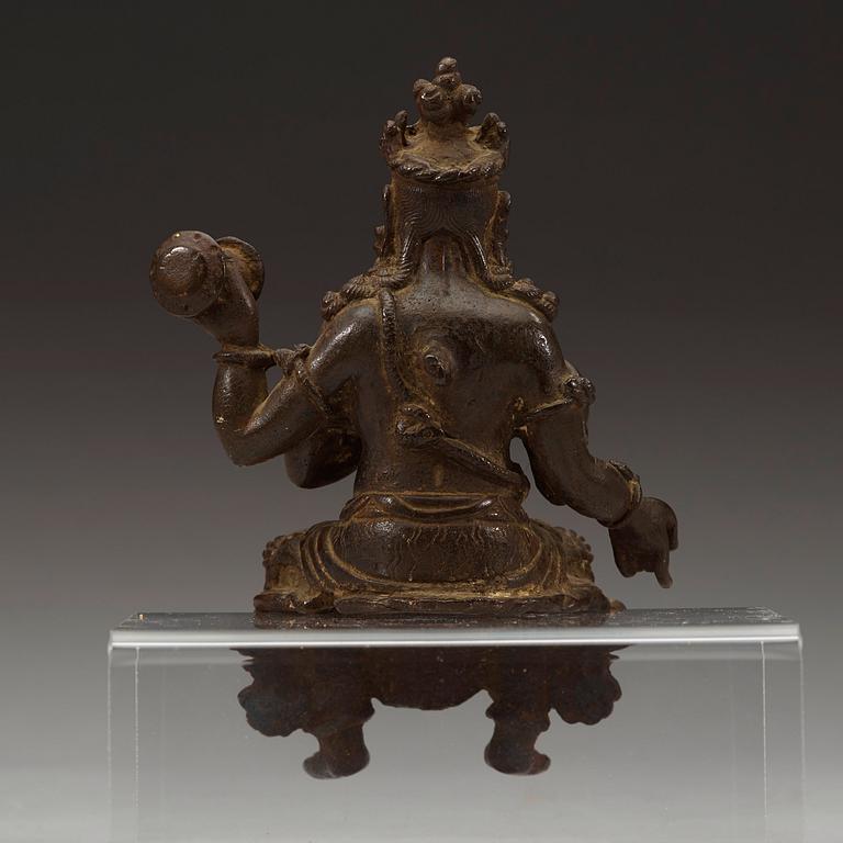 A seated bronze figurine. Ming dynasty.