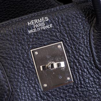 A dark blue togo "Birkin 35" bag by HermÈs from 2009.