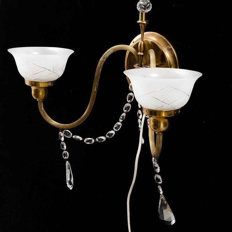 A 20th century brass wall lamp.
