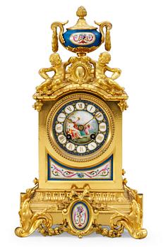 136. A French 19th cent mantel clock, marked "Sèvres" and signed "S.W.Lom".