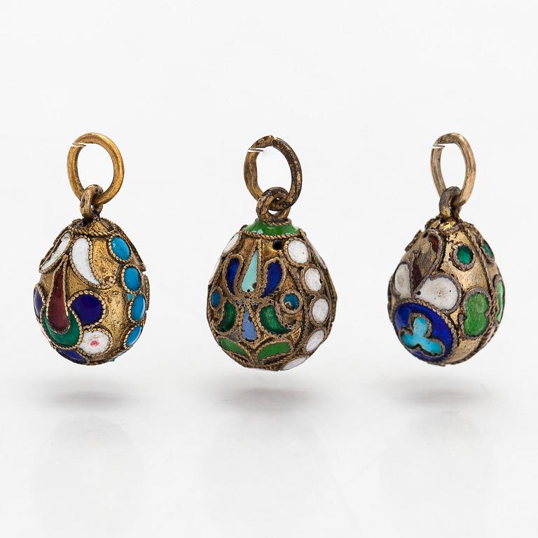 A collection of 24 egg pendants in original wooden box, Russia, early 20th century.