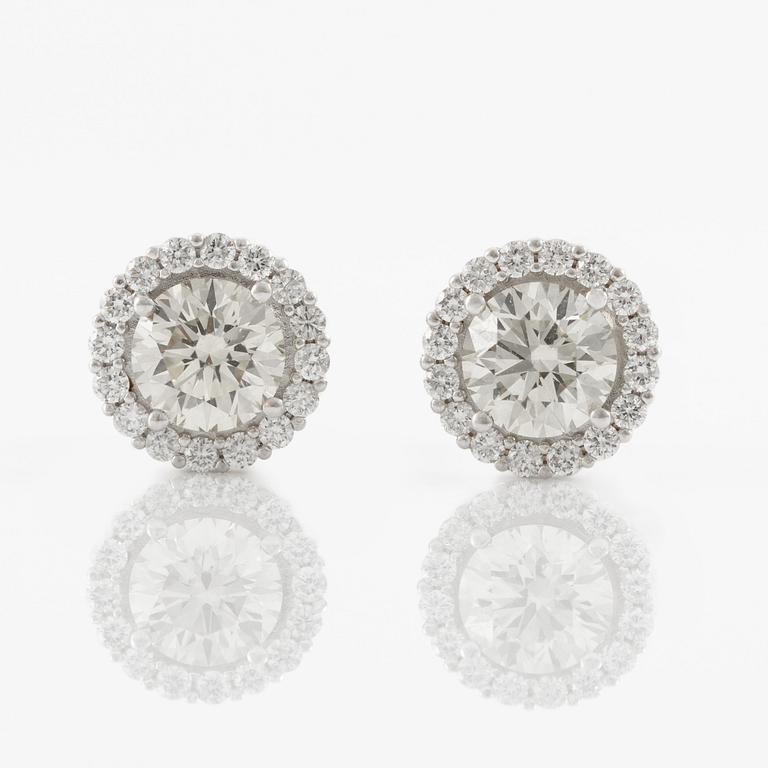 Earrings 18K white gold with yellow brilliant-cut diamonds total weight approx. 0.80 ct.