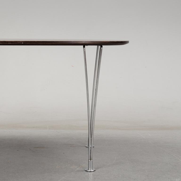 A 'Super-elliptical table by Piet Hein & Bruno Mathsson for Fritz Hansen.
