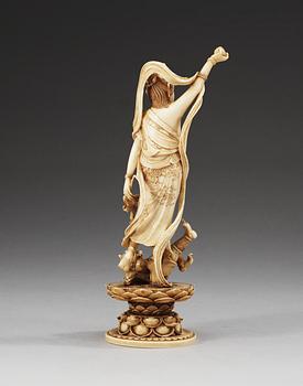 An ivory figure of Guanyin, Qing dynasty. Signed at base.
