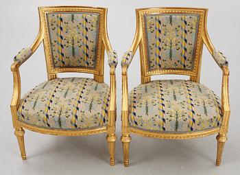 A pair of Gustavian style armchairs, 20th century.