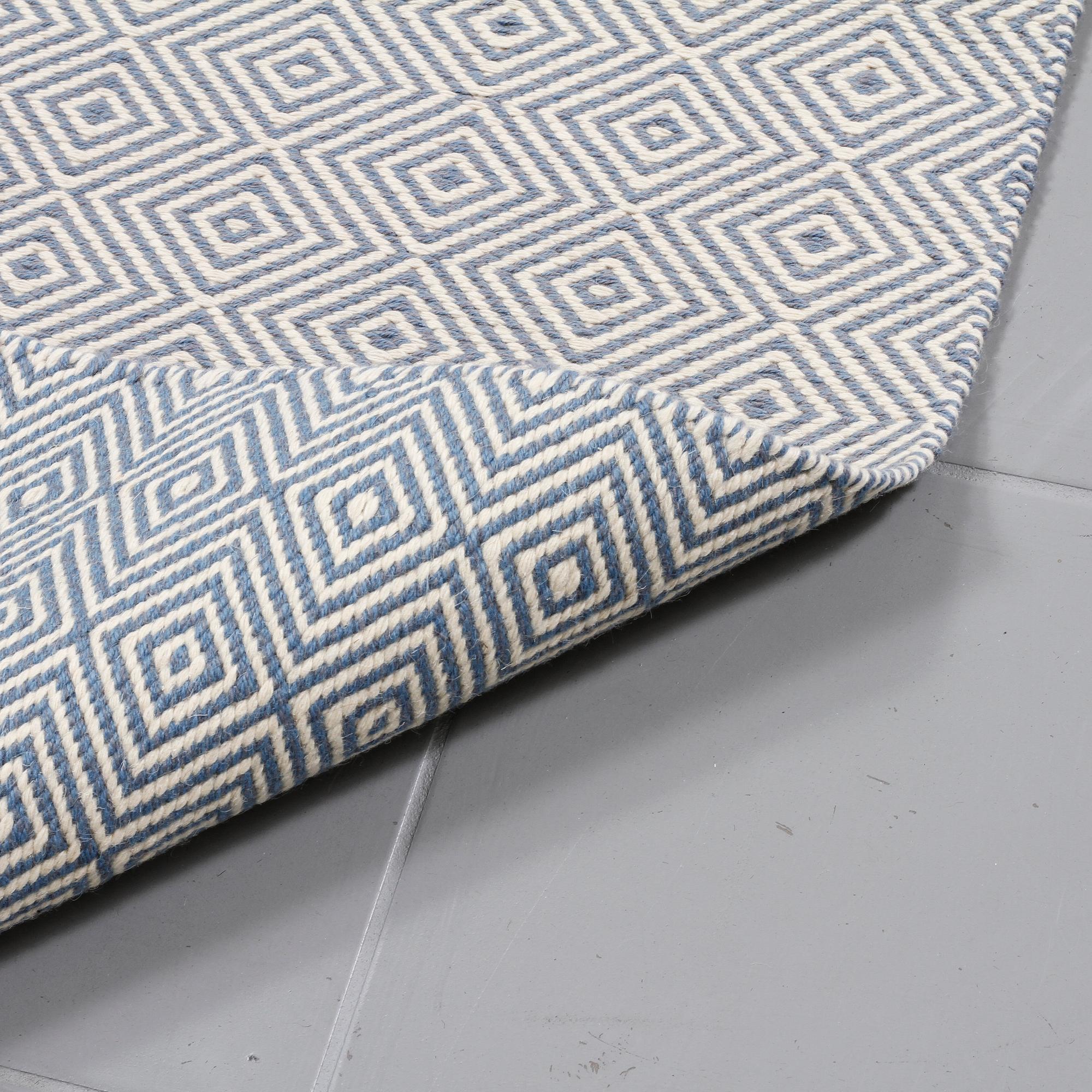 A rug by Gunilla Lagerhem Ullberg for Kasthall, model "Häggå Goose Eye", second half of the 20th century, 190 x 79 cm.