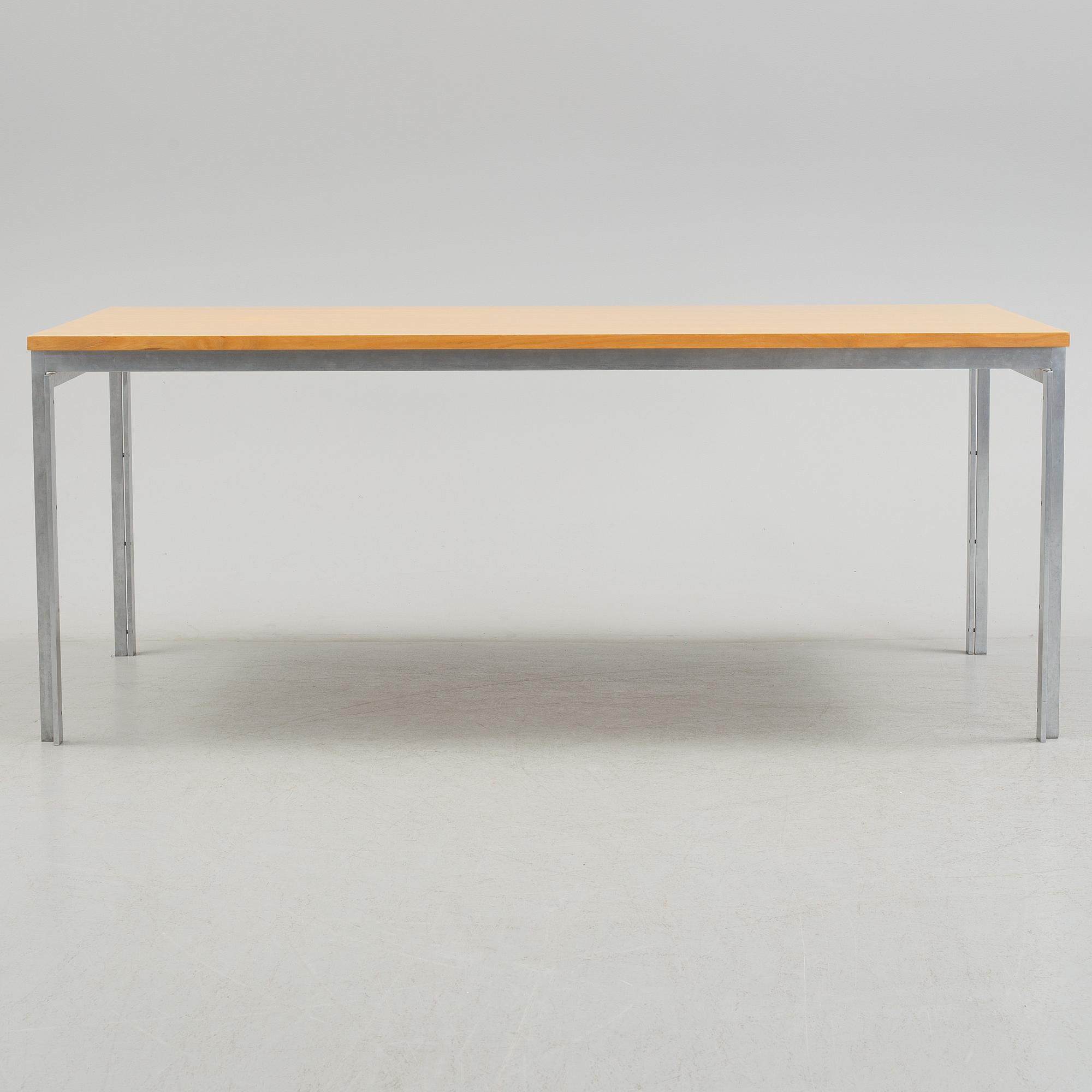 A Poul Kjaerholm "PK-55" table from Fritz Hansen, Denmark.