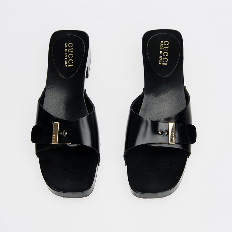 SKOR, Gucci.