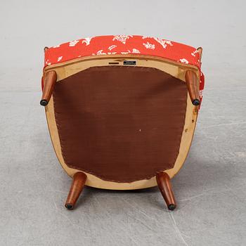 A 'Vår fru' armchair designed by Carl Malmsten, AB OH SJögren, Tranås, second half of the 20th century.